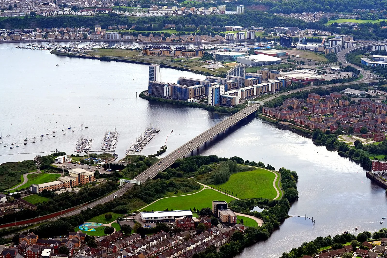 Aerial photograph of Cardiff Bay, river bridge and waterfront