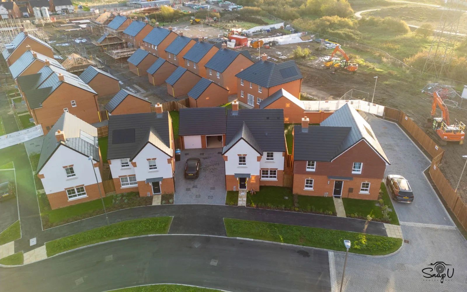 Construction progress drone photograph of a residential building site UK