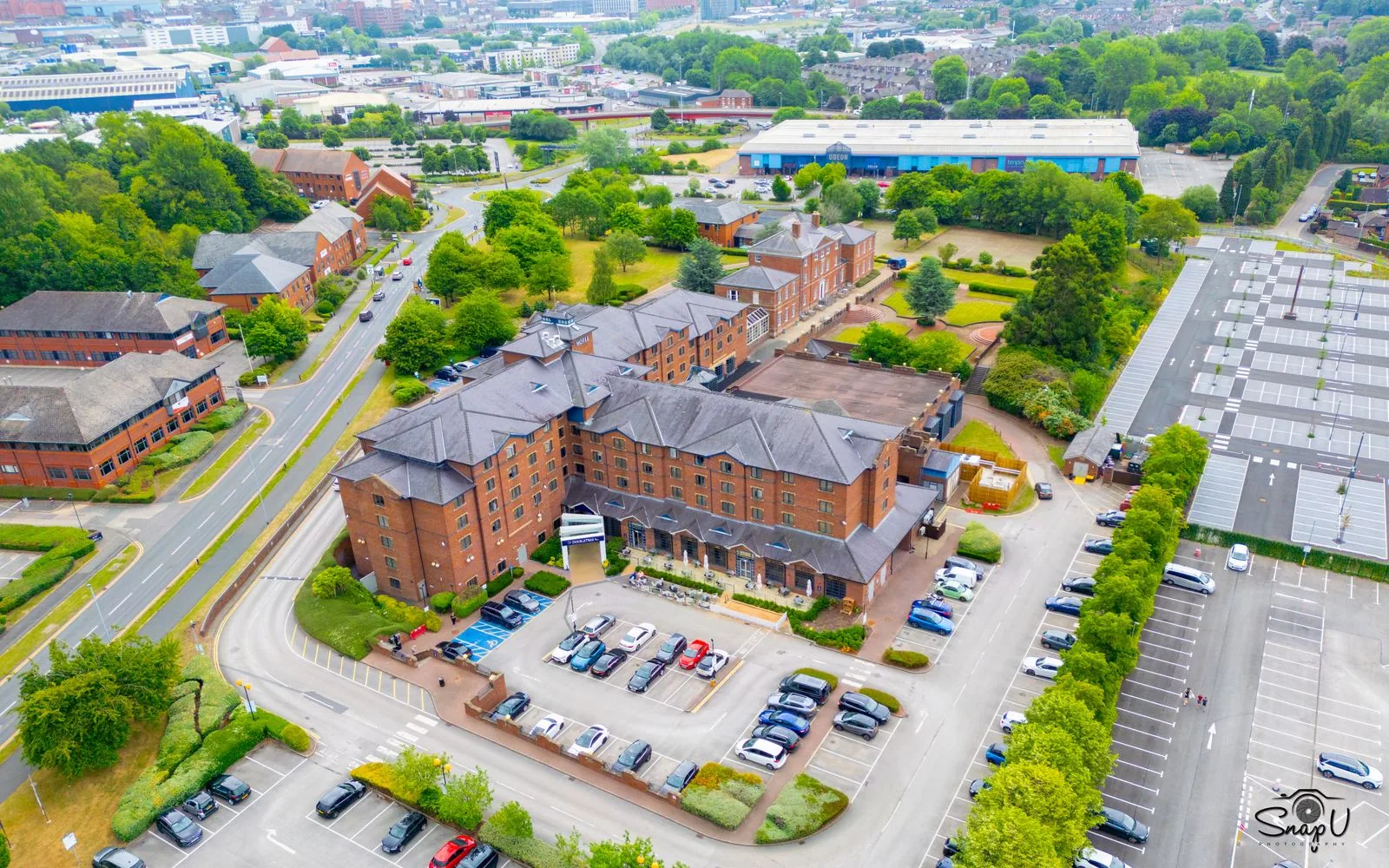 Commercial drone photography of a hotel complex and grounds for hospitality marketing UK