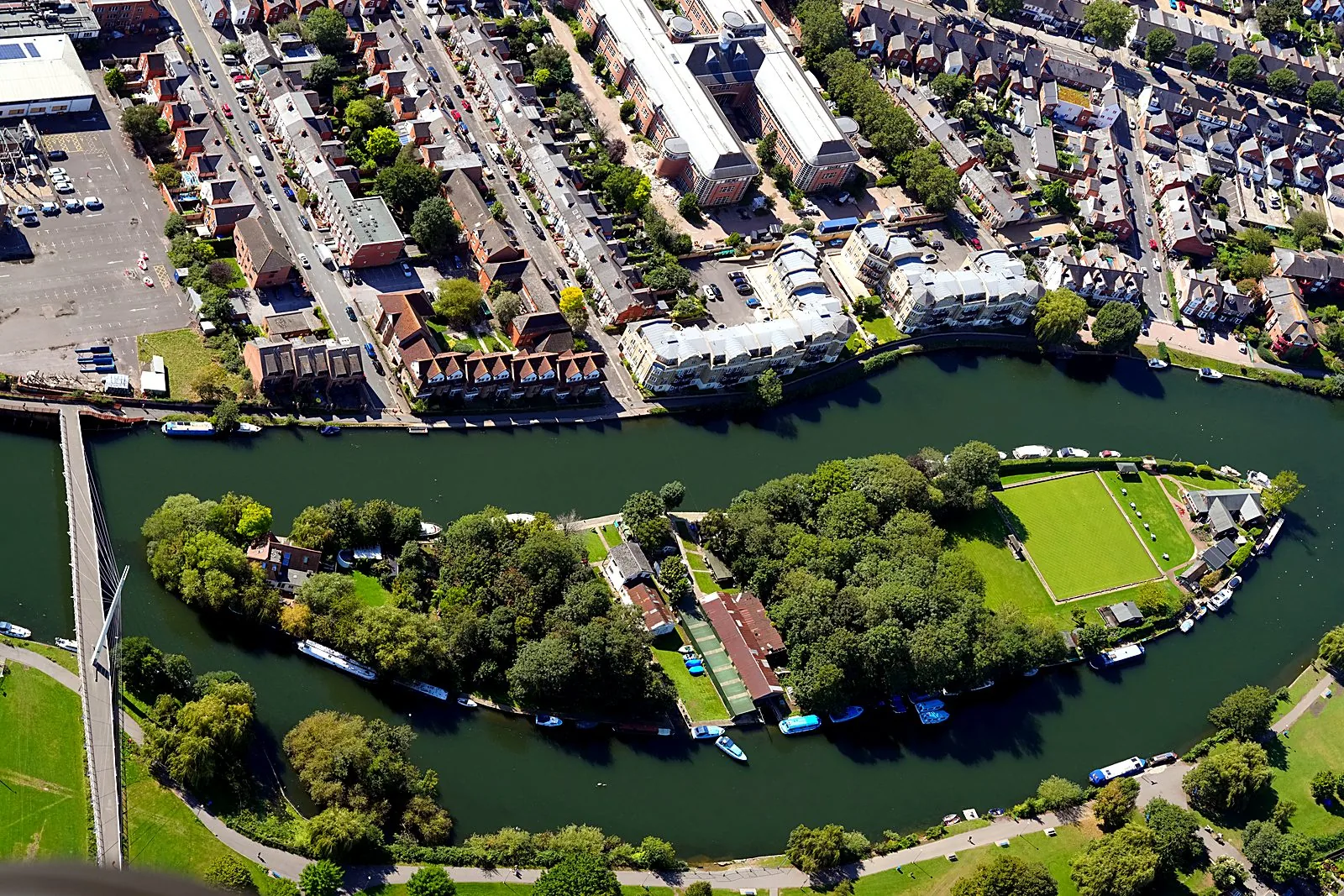 Aerial photograph of a Thames river island with narrowboats